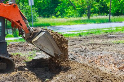 Prevent Soil Erosion with Grading and Leveling Service!